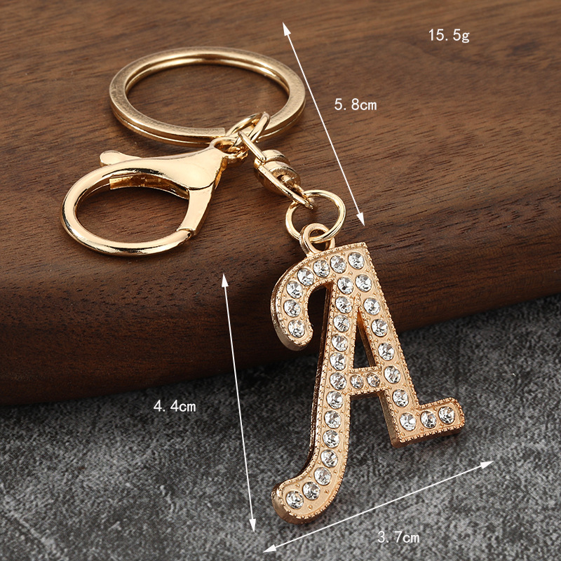 Metalowy brelok z 26 literami  – Women Bags Amazon recenzja i cena